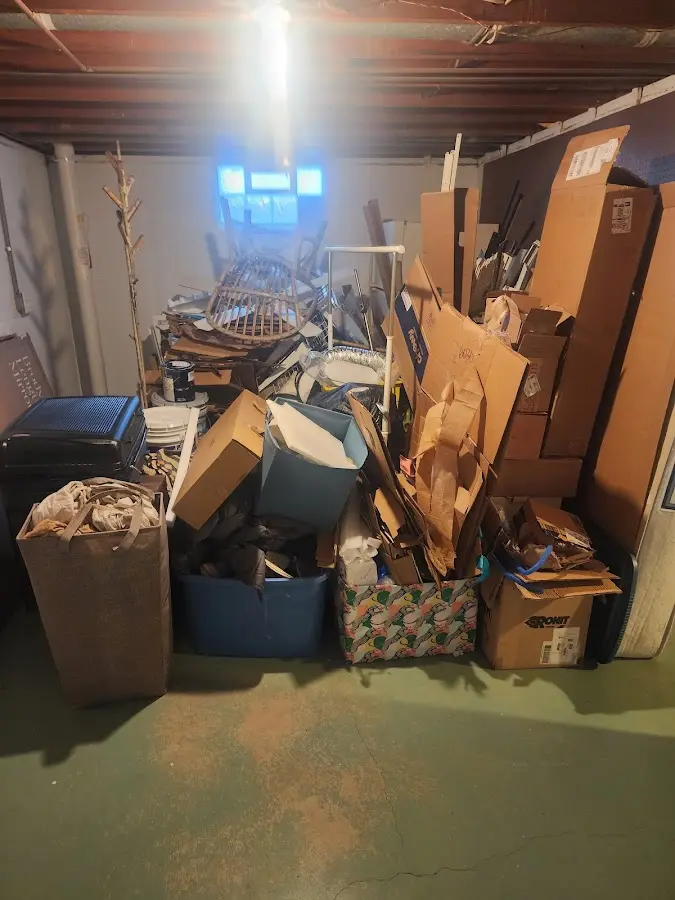 Roll-off dumpster container at job site for Construction Dumpster Rental in Osage Beach